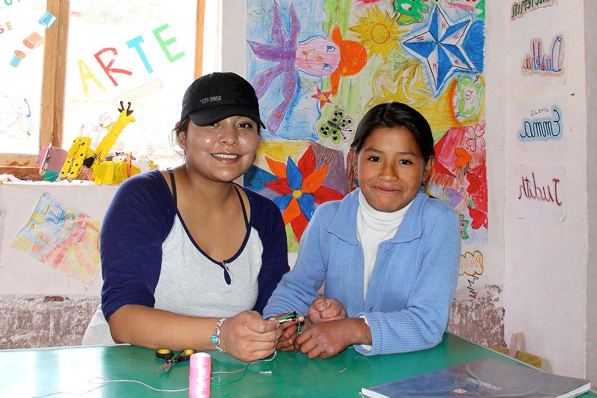 Child and volunteer in daycare setting